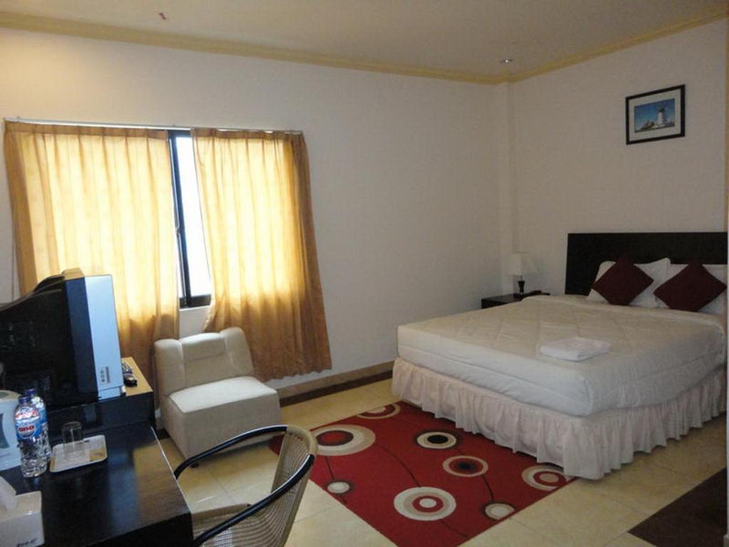 Grand Duta Hotel Palu Ruang foto